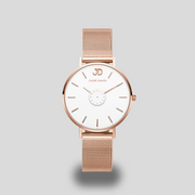 Montre femme or rose blanc saphir Montre femme acier or rose cadran blanc Jude Davis diamètre 34mm bracelet milanais interchangeable.   Verre saphir inrayable et incassable. ÉtanchéitMontre Quartz Montre Homme Montre Femme Montre Luxe Montre Design Montre Mode Montre Classique Montre Élégante Montre Vintage Montre Neuve Montre Acier Montre Cuir Montre Tendance Montre Unisexe Montre Stylée Montre Chic Montre Réduction Montre Promo  Idée cadeau similaire à Daniel Wellington Cluse Lip Pierre Lannier Mauboussin